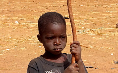 Life in African villages.  Even the youngest have work to do.